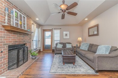Living with wood floor and wood burning fireplace