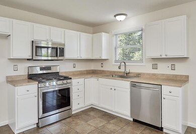 Ceramic tile flooring throughout this room, the br