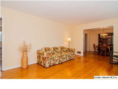 Living room flows to dining room.