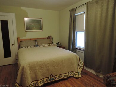 Largest of 3 bedrooms with hardwood floors.