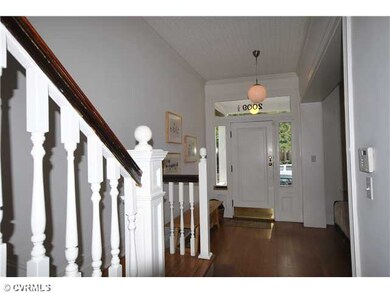 Foyer - Wide entrance hallway and beautiful stairc