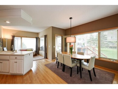 ...kitchen sitting and dining area with a walk-out