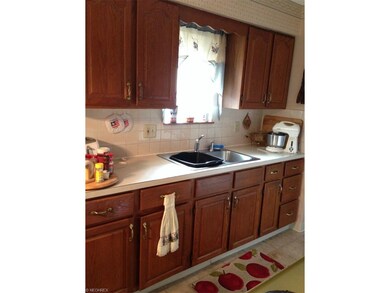 312 Thelma Dr, Sheffield Lake, OH 44054 - photo 2