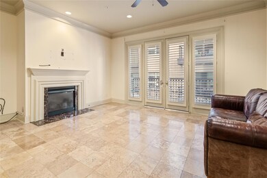 Living Room showing Balcony and Fireplace