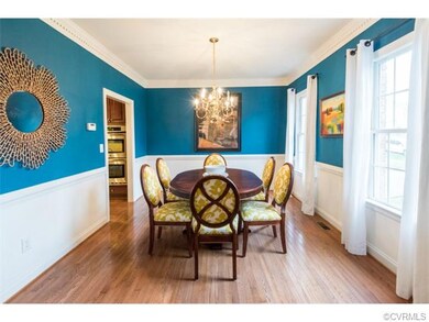 Formal dining room with chair rail