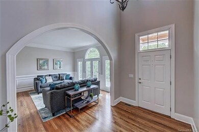 Entrance to light infused  20' living room/dining 