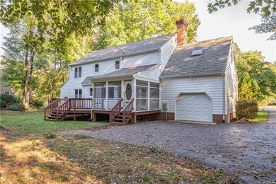 Notice the Garage, Deck and Wonderful Screened Porch!