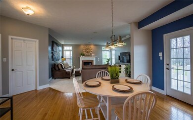 Breakfast area off kitchen and living room looks o