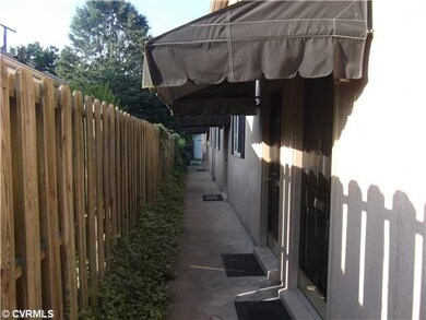 Exterior Front - Awning covered entrance with park