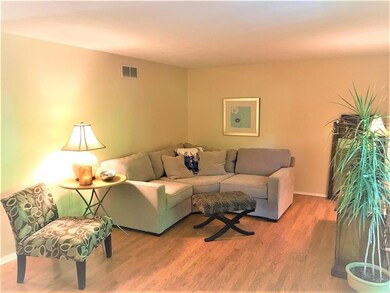 Updated laminate flooring in the living room space