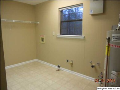 Nice size laundry off the kitchen hall way