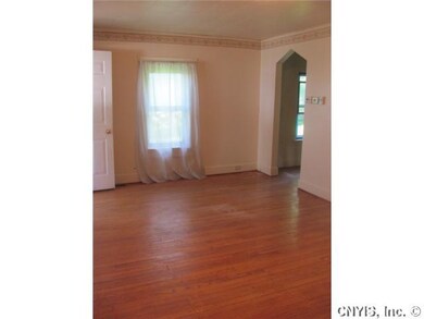 Living Room. The living room opens into the dining