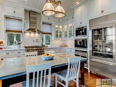 The kitchen is open to the great room and was reno