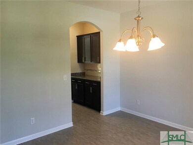 Looking From Foyer Through Dining Room Into Butler