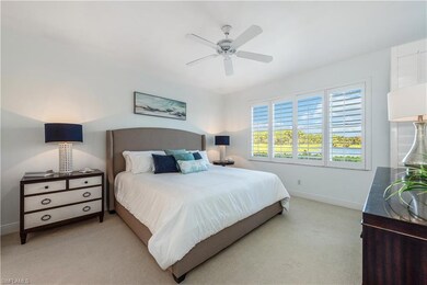 Bedroom featuring carpet and ceiling fan