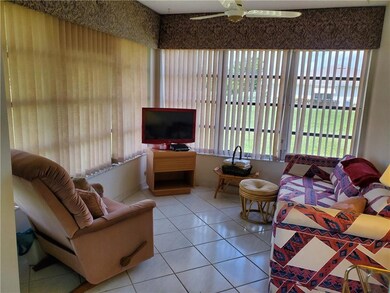 Air-conditioned den, reading room, or inside patio