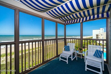 Screened, covered porch w/ beach views