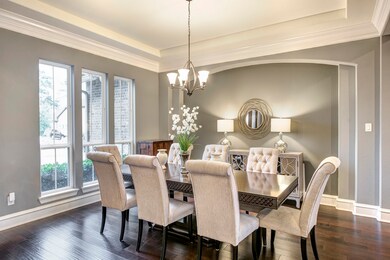 Dining room with hand-scraped hardwoods and plenty