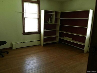 Bedroom. First floor bedroom with bookshelves