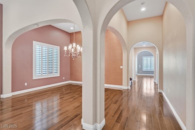 Formal Dining and Living Room framed by dramatic a