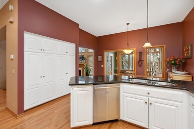 Entertain wonderfully with eat-in dining, views to your sun room and family room.