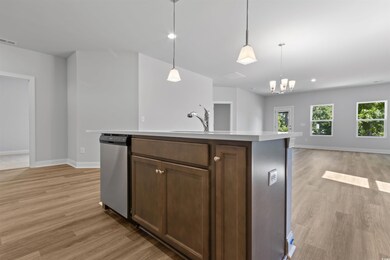 Kitchen featuring light wood-type flooring, decora