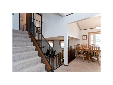 Dining Area. Staircase to upper level - entry to d