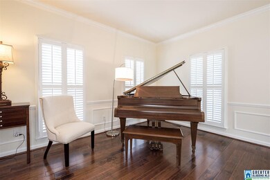 Formal living room is spacious enough for a grand 