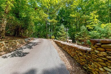 Very private lot with rock lined driveway....