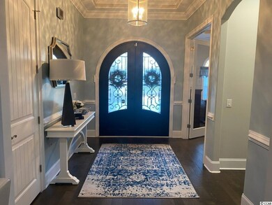 BEAUTIFUL ENTRANCE THROUGH DOUBLE METAL DOORS