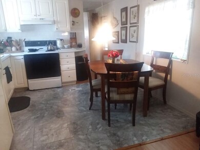 KITCHEN RIGHT OFF THE OPEN LIVING SPACE SO YOU CAN