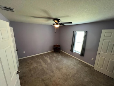 Primary Bedroom with walkin closet and private primary bath