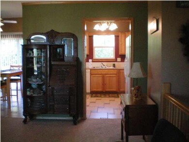 THE LIVING/DINING/KITCHEN AREA IS VERY OPEN AND HA