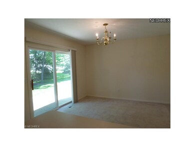 Formal Dining room with entrance to private patio.