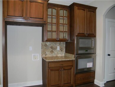 Custom Cabinets, Stainless Steel Oven & Built in M