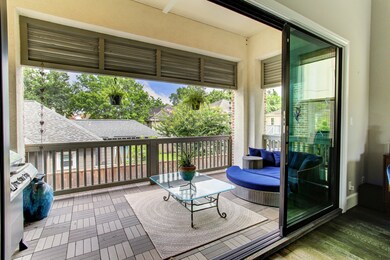 The sliding glass doors open wide onto the oversiz