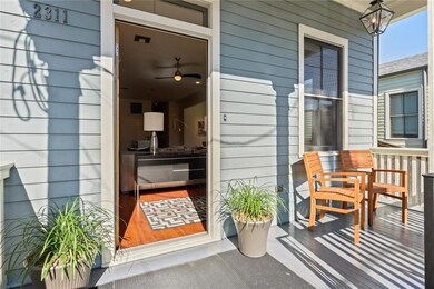 Covered front porch overlooking the garden