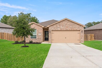 Brick exterior and large front and back yards.