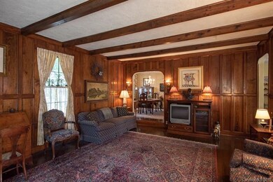 Throughout the cottage please note the arched door