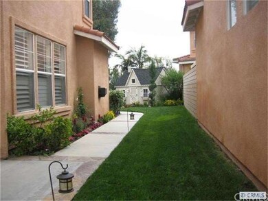 View of side yard from front gate.