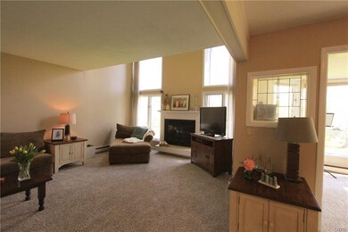 Family room, with cozy fireplace, to take the chil