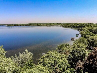 120 feet of hard sandy lakeshore on beautiful Lake