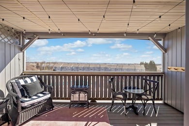 Deck overlooking patio and pool