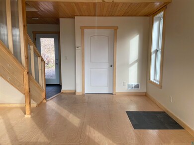 Foyer featuring light hardwood / wood-style floori
