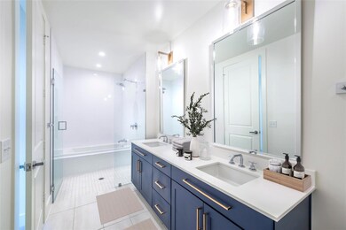 Full bathroom with tile patterned floors, a shower