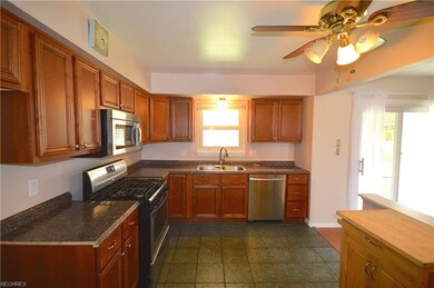 Kitchen with upgraded appliances and cabinets.