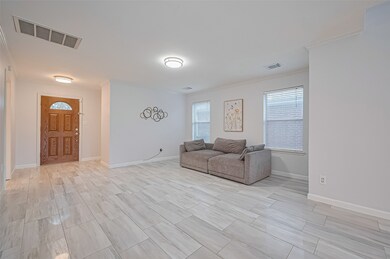Bright and open with sleek tile flooring throughou