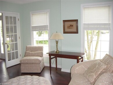 French doors at the left of the main entry guide t