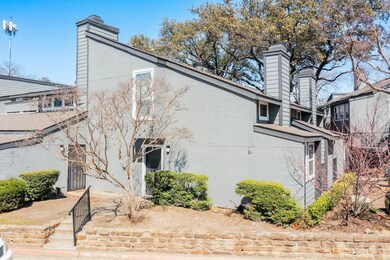 View of side of property featuring stucco siding a