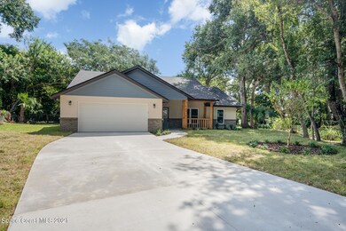 405 Indian Oaks Ct, Titusville, FL 32796 - photo 2